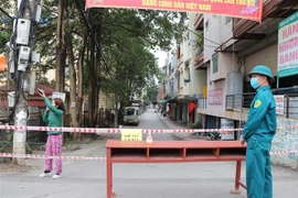 Khu vực cách ly có trường hợp dương tính với COVID-19, tại tổ 3, phường Đồng Tiến, thành phố Hòa Bình. (Ảnh: Thanh Hải/TTXVN)