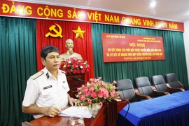 Chuẩn Đô đốc Ngô Văn Thuân phát biểu tại hội nghị. (Ảnh: Phan Sáu-Đức Thu/Vietnam+)