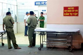 Công an phong tỏa hiện trường vụ việc. (Ảnh: TTXVN phát)