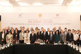 Thủ tướng New Zealand Jacinda Ardern và các đại biểu tham dự Diễn đàn doanh nghiệp Việt Nam-New Zealand. (Ảnh: Đức Duy/Vietnam+)