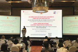 Hội thảo "Xu hướng toàn cầu và Việt Nam: Quan điểm từ Chiến lược Xuất khẩu Quốc gia," do Dự án hỗ trợ kỹ thuật Chính sách thương mại và xúc tiến xuất khẩu của Việt Nam tổ chức. (Ảnh: Đức Duy/Vietnam+)