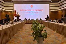 Phiên họp báo Chính phủ ngày 1/12. (Ảnh: Xuân Quảng/Vietnam+)