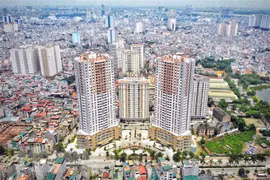 Tổ công tác của Chính phủ sẽ làm việc với các địa phương, doanh nghiệp để khơi thông thị trường bất động sản. (Ảnh: TTXVN)