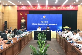 Hội nghị: “Triển khai Kế hoạch thực hiện Hiệp định Đối tác Kinh tế Toàn diện Khu vực-RCEP,” do Bộ Công Thương tổ chức ngày 13/7. (Ảnh: Đức Duy/Vietnam+)