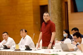 Trung tướng Tô Ân Xô, Chánh Văn phòng Bộ Công an thông tin về việc cấp hộ chiếu mới. (Ảnh: Xuân Quảng/Vietnam+)