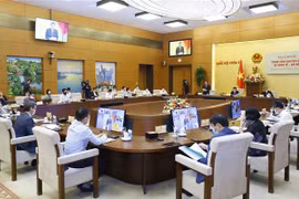 Tọa đàm tham vấn chuyên gia về kinh tế-xã hội do Chủ tịch Quốc hội Vương Đình Huệ chủ trì, tại Nhà Quốc hội ngày 27/9/2021. (Ảnh: Doãn Tấn/TTXVN)