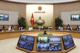 Phó Thủ tướng Vũ Đức Đam chủ trì họp Ban Chỉ đạo Quốc gia phòng chống COVID-19. (Ảnh: Doãn Tấn/TTXVN)