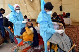 Ấn Độ nối lại đường bay với Anh, chuẩn bị cho đợt tiêm chủng miễn phí