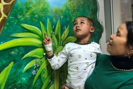 Điều trị thành công cho bệnh nhi bị vết thương sọ não hở do chó cắn
