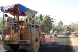 Làm đường giao thông ở phường Tân Đồng (Đồng Xoài, Bình Phước). (Nguồn: Báo Bình Phước)