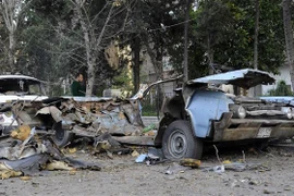 Hiện trường một vụ đánh bom xe tại Damascus, Syria. (Ảnh: AFP/TTXVN)