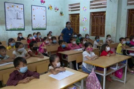 Học sinh lớp 2, trường Phổ thông dân tộc bán trú – Tiểu học Niêm Sơn, xã Niêm Sơn, huyện Mèo Vạc (Hà Giang). (Ảnh: Nguyễn Chiến/TTXVN)