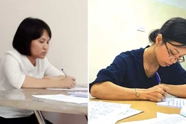 Hai đối tượng Nguyễn Thị Vân và Vũ Kim Oanh tại cơ quan Công an. (Nguồn: laodong.vn)