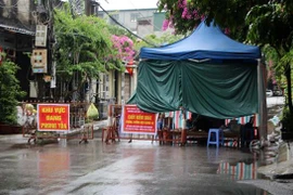 Khu vực phong tỏa tại đường Lê Vãn, thành phố Thanh Hóa, tỉnh Thanh Hóa. (Ảnh: Nguyễn Nam/TTXVN)