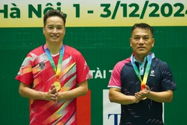 Cặp đôi Nguyễn Trang Dũng (Báo Công an Nhân dân) và Đặng Ngọc Hải (Hội Nhà báo Hà Nội) giành huy chương Vàng nội dung đôi nam Giải Vô địch Bóng bàn Hội Nhà báo Việt Nam năm 2024. (Ảnh: Việt Anh/Vietnam+)