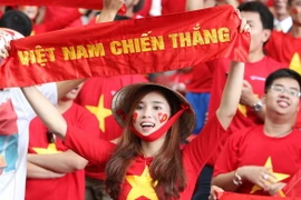 Cổ động viên luôn ủng hộ hết mình cho đội tuyển U23 Việt Nam. (Ảnh: Quốc Khánh/TTXVN)