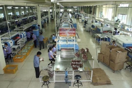 Công nhân Triều Tiên làm việc tại một nhà máy ở Khu công nghiệp chung Keasong. (Nguồn: koreatimesus.co)