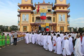 Lễ kỷ niệm ngày Hoằng khai Đại đạo Tam kỳ Phổ độ tại Tây Ninh năm 2014. (Ảnh: TTXVN)