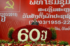 Míttinh kỷ niệm 60 năm thành lập Đảng Nhân dân Cách mạng Lào