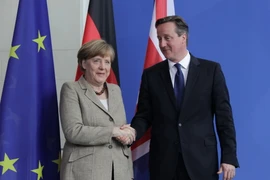 Thủ tướng Anh David Cameron trong chuyến thăm Đức thảo luận về kế hoạch cải cách EU. (Ảnh: Mạnh Hùng/TTXVN)