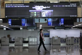 Cảnh vắng vẻ tại sân bay quốc tế Gimpo, phía tây thủ đô Seoul, Hàn Quốc ngày 12/3/2020, trong bối cảnh dịch COVID-19 lan rộng. (Ảnh: Yonhap/TTXVN)