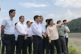 Phó Thủ tướng Phạm Bình Minh thị sát khu vực biên giới thuộc huyện Bát Xát, tỉnh Lào Cai. (Ảnh: Hồng Ninh/TTXVN)