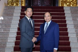 Thủ tướng Nguyễn Xuân Phúc tiếp ông Iwamura Yasutsugu, Tổng Giám đốc Công ty TNHH Aeon Mall Việt Nam (thuộc Tập đoàn Aeon, Nhật Bản). (Ảnh: Thống Nhất/TTXVN)