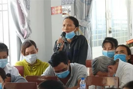 Đại diện người dân bày tỏ mong muốn, nguyện vọng tại buổi gặp gỡ. (Ảnh: Sỹ Thắng/TTXVN)