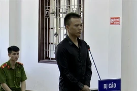 Bị cáo Nguyễn Văn Khánh nhận tội tại phiên tòa. (Ảnh: Thanh Hải/TTXVN)