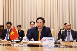 Phó Thủ tướng, Bộ trưởng Bộ Ngoại giao Phạm Bình Minh dự và phát biểu tại Phiên họp. (Ảnh: Lâm Khánh/TTXVN)