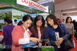 Khách tham dự VITM 2019. (Nguồn: TTXVN)