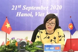 Bà Hà Thị Minh Đức – Phó Vụ trưởng Vụ Hợp tác quốc tế (Bộ Lao động-Thương binh và Xã hội) phát biểu tại diễn đàn. (Ảnh: Thanh Tùng/TTXVN)