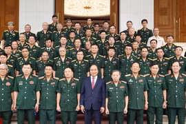 Thủ tướng Nguyễn Xuân Phúc chụp ảnh chung với các đại biểu. (Ảnh: Thống Nhất/TTXVN)