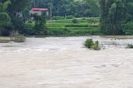 Cầu ngầm xóm Háng Thoang, xã Đàm Thủy - nơi anh Hoàng Văn Cương bị nước lũ cuốn trôi. (Ảnh: TTXVN)