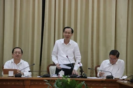 Ông Lê Thanh Liêm, Phó Chủ tịch Thường trực UBND Thành phố Hồ Chí Minh, phát biểu tại buổi làm việc. (Ảnh: Hứa Chung/TTXVN)