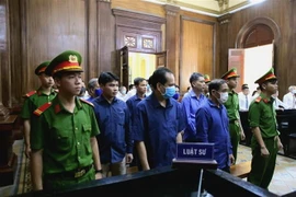 Các bị cáo tại phiên xét xử. (Ảnh: Thành Chung/TTXVN)