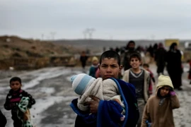 Người dân Iraq sơ tán khỏi Mosul ngày 3/3. (Nguồn: AFP/TTXVN)