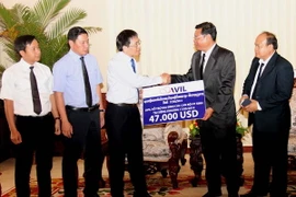 AVIL hỗ trợ các gia đình nạn nhân vụ tai nạn máy bay ở Lào