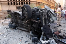 Hiện trường một vụ đánh bom ở Tripoli. (Nguồn: THX/TTXVN)