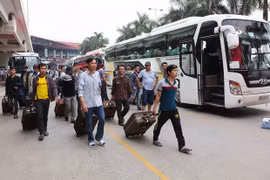 Lao động đi làm việc ở nước ngoài trở về. (Ảnh minh hoạ: Vietnam+)