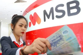 MSB giảm đến 3%/năm lãi suất cho vay hỗ trợ khách hàng dịp cuối năm. (Ảnh: CTV/Vietnam+)