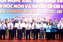 Hội nghị xúc tiến đầu tư vào huyện Hóc Môn và Củ Chi (TP.HCM) nhân chuyến công tác của Chủ tịch nước Nguyễn Xuân Phúc tiếp tục thu hút đóng góp của các doanh nghiệp trong và ngoài nước. (Ảnh: Vietnam+)