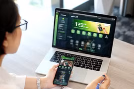 Vietcombank giảm phí dịch vụ tin nhắn SMS Banking về lại mức cũ. (Ảnh: Vietnam+)