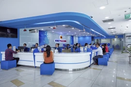 Giao dịch tại Vietbank. (Ảnh: CTV/Vietnam+)