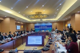 Các đại biểu tham dự tại hội thảo “Tài chính tiêu dùng - kênh dẫn vốn hiệu quả với người yếu thế". (Ảnh: Vietnam+)