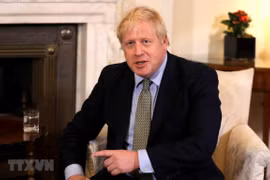 Thủ tướng Anh Boris Johnson phát biểu tại London, ngày 8/1/2020. (Ảnh: AFP/TTXVN)