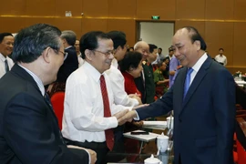 Thủ tướng Nguyễn Xuân Phúc và các đại biểu. (Ảnh: Thống Nhất/TTXVN)