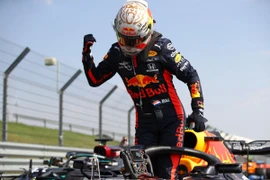 Max Verstappen với chiến thắng đáng nhớ. (Ảnh: SCMP)