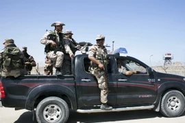 Các thành viên Phong trào Hồi giáo Hamas tập trung tại Rafah, phía nam Dải Gaza, giáp giới Ai Cập ngày 21/4. (Nguồn: AFP/TTXVN)