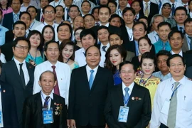 Thủ tướng Nguyễn Xuân Phúc với các đại biểu. (Ảnh: Thống Nhất/TTXVN)